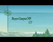 brca Bryce Canyon - het amfitheater bij een warme ochtendzon en onder een grauwe regenhemel.